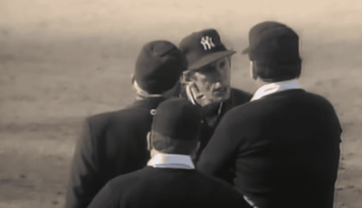 Billy Martin, known for his fiery demeanor, confronts an umpire during a game.
